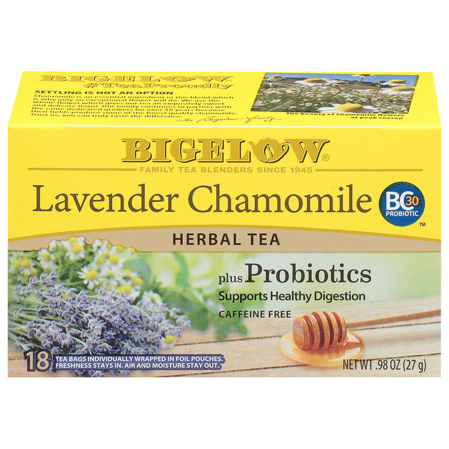 Bigelow Lavender Chamomile Herbal Tea box with honey dipper and lavender flowers on a white background