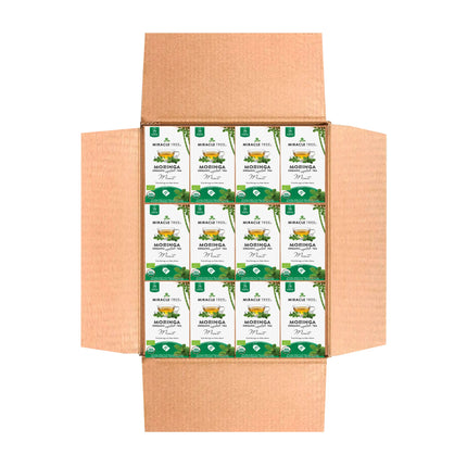 An open cardboard box contains nine neatly arranged green and white packages of Miracle Trees Organic Moringa Tea, Mint. Each package showcases a green leaf design, promoting this caffeine-free superfood tea.