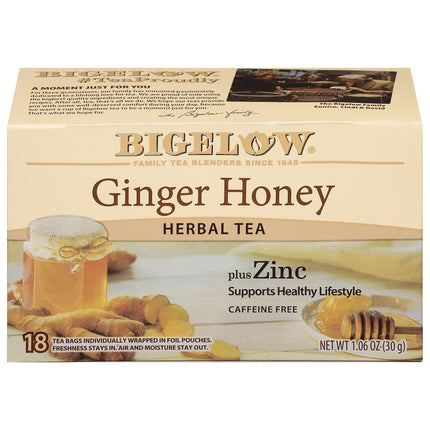 Box of Bigelow Ginger Honey Herbal Tea with ginger and honey imagery on a beige background