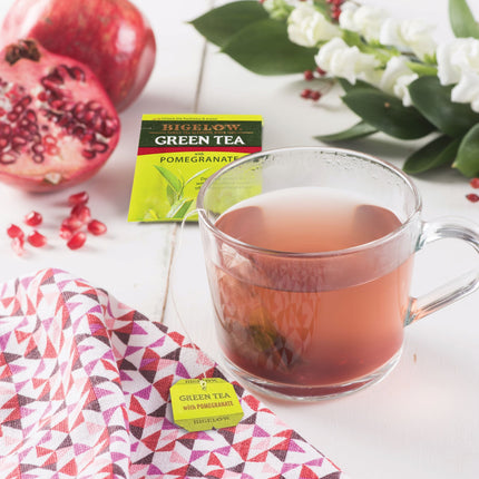 Glass mug of Green Tea with Pomegranate 